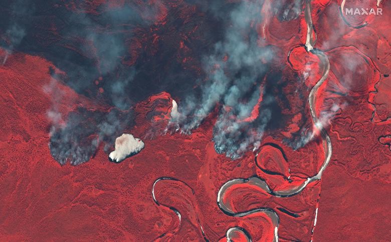 Smoke rises from wildfires near Berezovka River in Russia. ©2020 Maxar Technologies via REUTERS